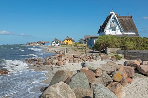 Thatched roof houses on the beach, Graswarder peninsula