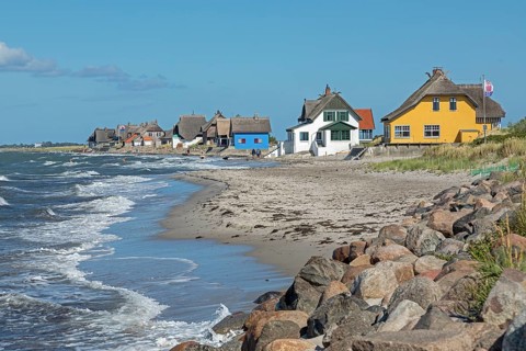 Thatched roof houses on the beach, Graswarder peninsula