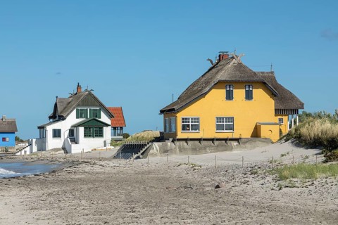 Thatched roof houses on the beach, Graswarder peninsula