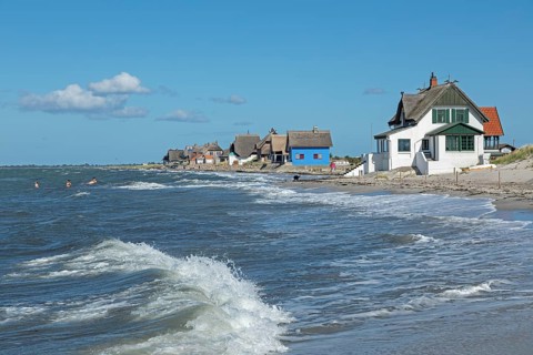 Thatched roof houses on the beach, Graswarder peninsula
