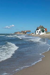 Thatched roof houses on the beach, Graswarder peninsula