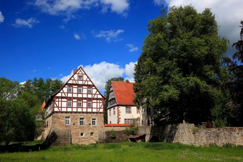 Castle and moated palace of Mackenzell near Huenfeld, Fulda district