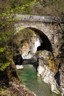 Roman bridge or devil's bridge over the Tauglbach gorge, adventure trail