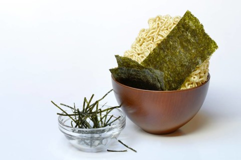 Nori, dried papery sheets of seaweed and Asian noodles in shells