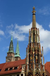 Beautiful fountain and towers of the Sebaldus Church, Hauptmarkt