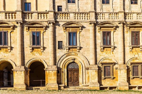 Cream-coloured facade of the Palazzo Capitano, Piazza Grande