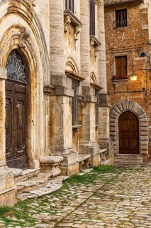 Entrances to houses in Piazza Grande, Montepulciano