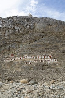 Small white stupa on the mountainside, Hunder Gompa