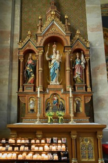 Side altar with sacrificial candles, Catholic Parish Church