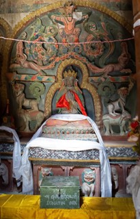 Black saint figure with prayer cloths, Lamayuru Monastery or Lamayuru Gompa