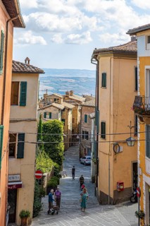Lively alleyway in Montalcino, Tuscany