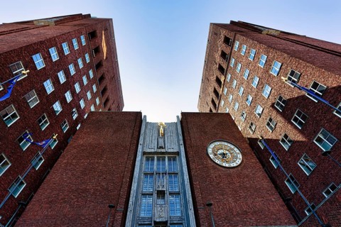 Monumental red brick city hall, north side facade