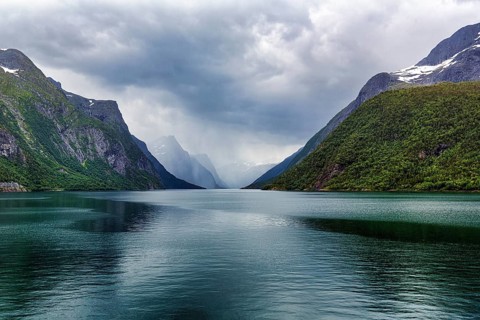 Lake Eikesdal, Eikesdalvatnet with high cloudy mountains