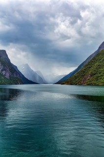 Lake Eikesdal, Eikesdalvatnet with high cloudy mountains