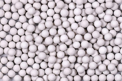 Top view of ceramic pie weights used to keep crust from shrinking during blind baking,