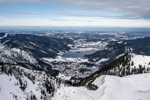 View from the top of the Jagerkamp to Schliersee and village, mountains in winter