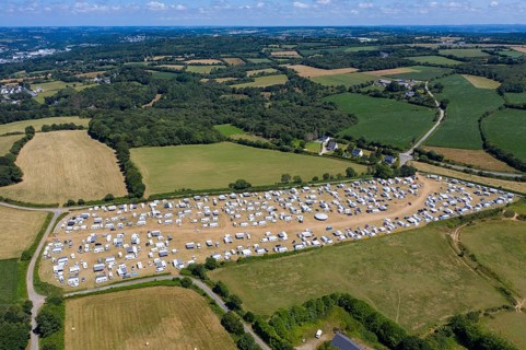 Aerial view of Gens de Voyage or Travelling People camp set up without permission in a field in Dirinon, Finistere Penn-ar-Bed department