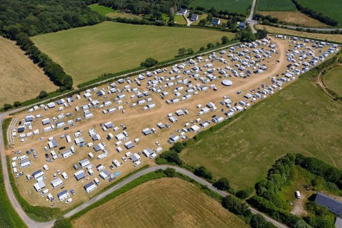 Aerial view of Gens de Voyage or Travelling People camp set up without permission in a field in Dirinon, Finistere Penn-ar-Bed department