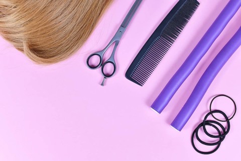 Hair styling concept with dark blond hair, elastic hair ties