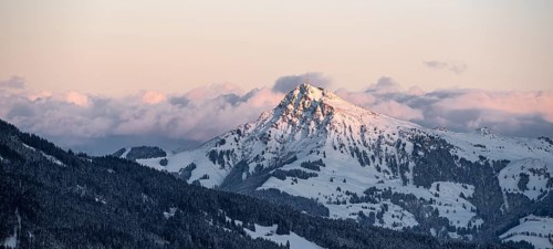 View of the Kitzbueheler Horn, Alps in winter with snow-covered mountains