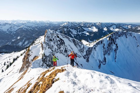 Ski tourers in winter on the snow-covered Rotwand, mountains in winter