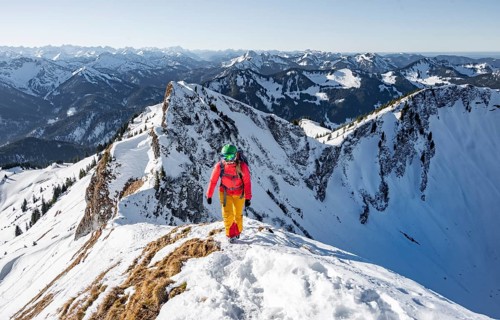 Ski tourers in winter on the snow-covered Rotwand, mountains in winter