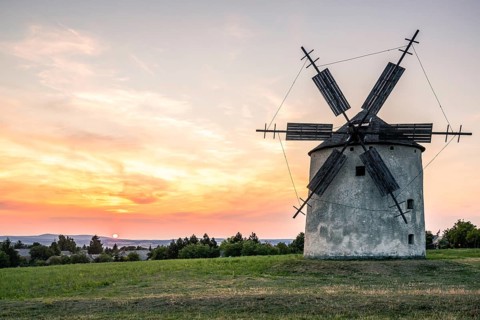 Old historic windmills in the sunset Tesi, balaton
