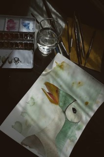 Painted goose, watercolour painting with water glass