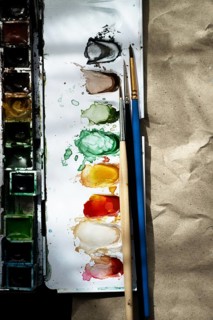 Watercolour paint box with brushes,
