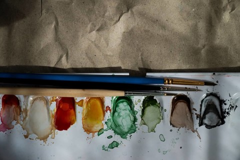 Watercolour paint box with brushes,