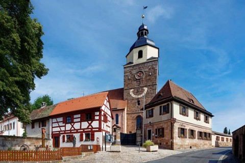 From left, fountain with local coat of arms sign