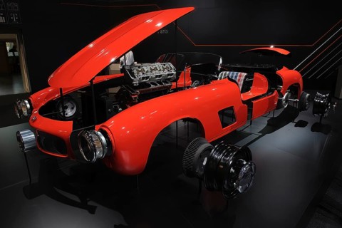 Cutaway model in the style of technical exploded view of vintage historic sports car Mercedes-Benz 300 SL Gullwing, Techno Classica trade fair