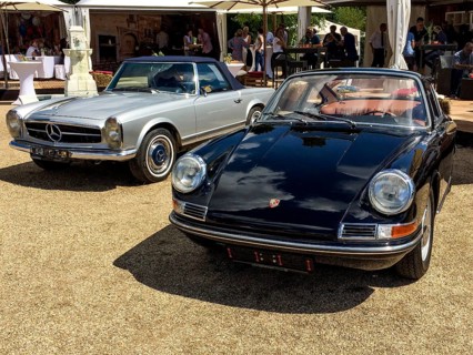 In front classic sports car Porsche 911 Urelfer from the 60s, behind historic sports car Mercedes SL
