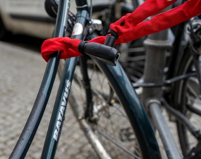 Red safety lock on bicycle, Berlin