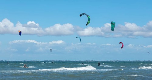 Kitesurfer in front of Graswarder peninsula, Heiligenhafen