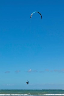 Kitesurfer jumps off Graswarder peninsula, Heiligenhafen