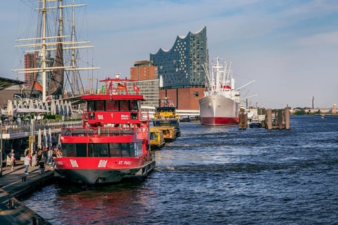 Harbour ferries at the St. Pauli Landungsbruecken with the Elbe Philharmonic Hall on the Elbe in the Port of Hamburg, Hamburg