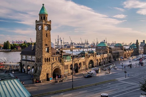 St. Pauli Landungsbruecken on the Elbe in Hamburg harbour in the evening sun, Hamburg