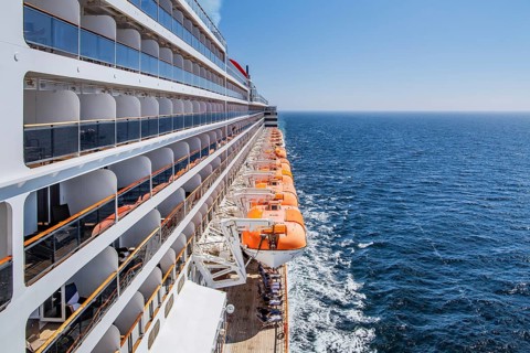 Transatlantic liner, Queen Mary 2 cruise ship on the high seas with boat deck and balcony cabins