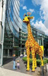 Giraffe made of Lego bricks in front of the entrance to Legoland at the Sony Center, Potsdamer Platz
