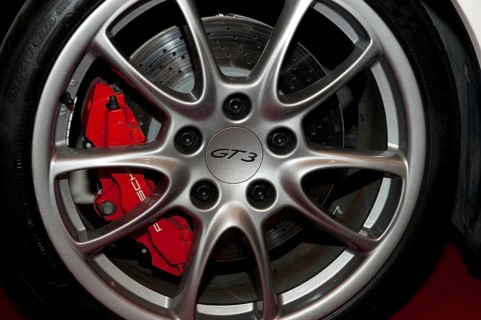 Sports rim Rim with lettering GT3 from Porsche 911 GT3, left behind red brake caliper