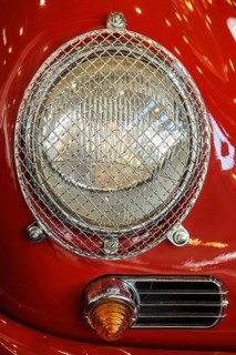 Round headlamp with grille as protection against stone chipping Glass breakage on historic classic sports car racing car classic car Porsche 356 2000 GT, Techno Classica trade fair