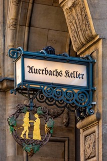 Inn sign Auerbachs Keller at the entrance of the Maedlerpassage, nose sign