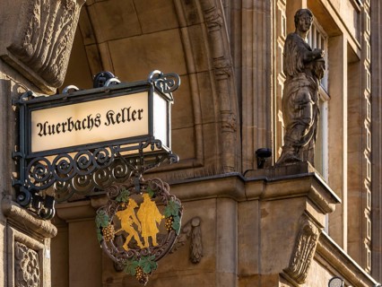 Inn sign Auerbachs Keller at the entrance of the Maedlerpassage, nose sign