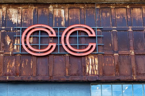 Facade of an old industrial hall with logo CC, Copenhagen Contemporary