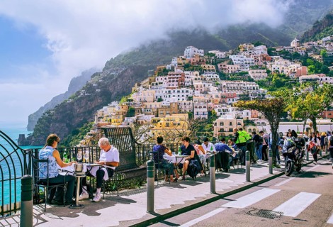 Street restaurant with panorama of the village, Positano