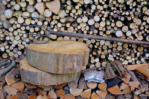 Firewood store with pitchfork