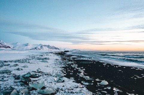 View over Diamond Beach in Iceland with Ice Cubes on the ground HQ