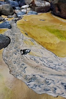 Stream inlet and coloured sand with patterns