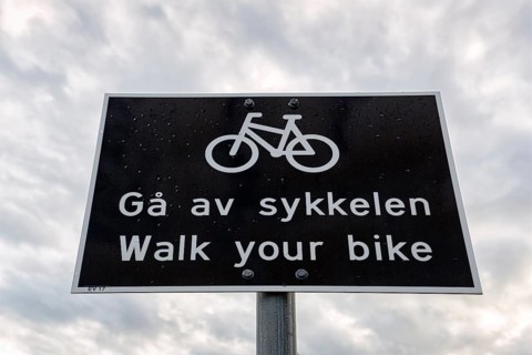 Black and white traffic sign